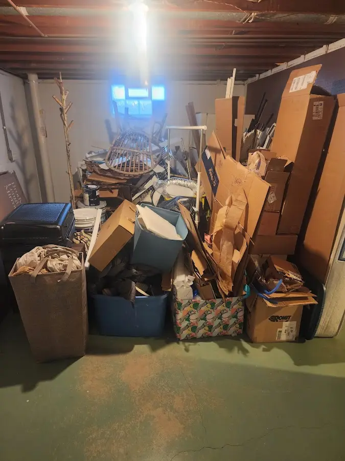 Roll-off dumpster container at job site for Cleanout Dumpster Rental in Old Bridge